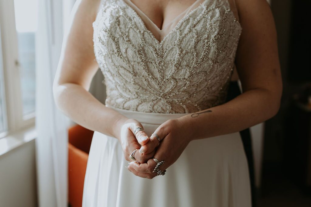 National Museum of Women in the Arts wedding of a bride featuring her detailed wedding dress.