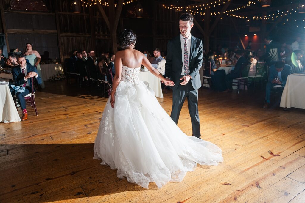 A couple having their first dance at their reception.