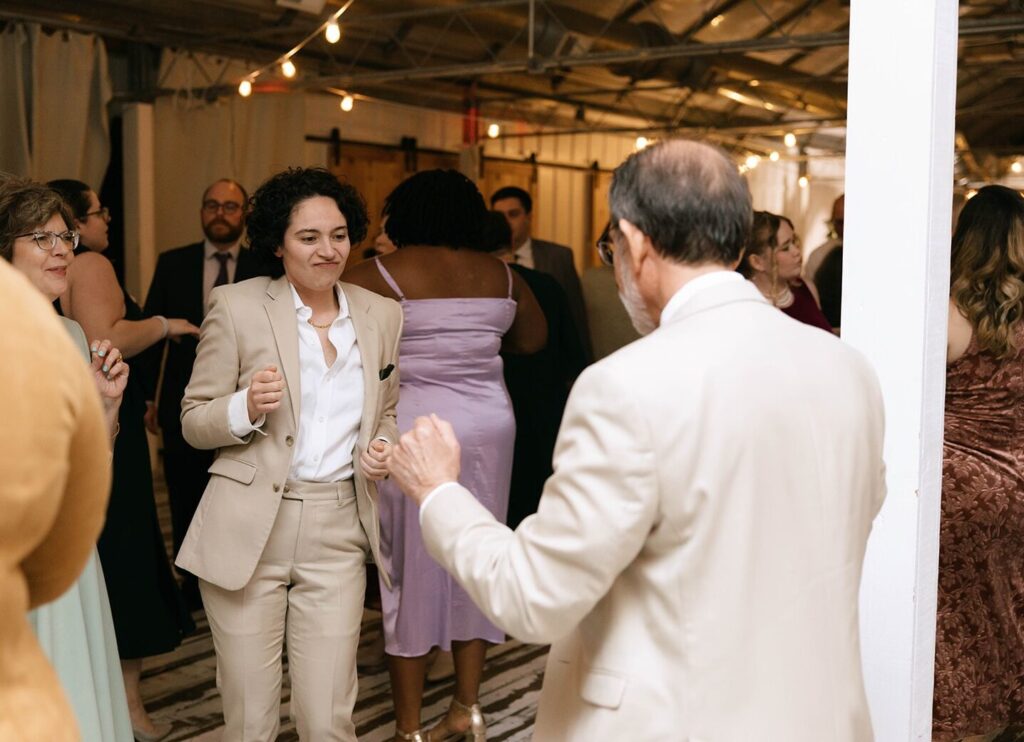 Family of the newlyweds dancing at a wedding reception