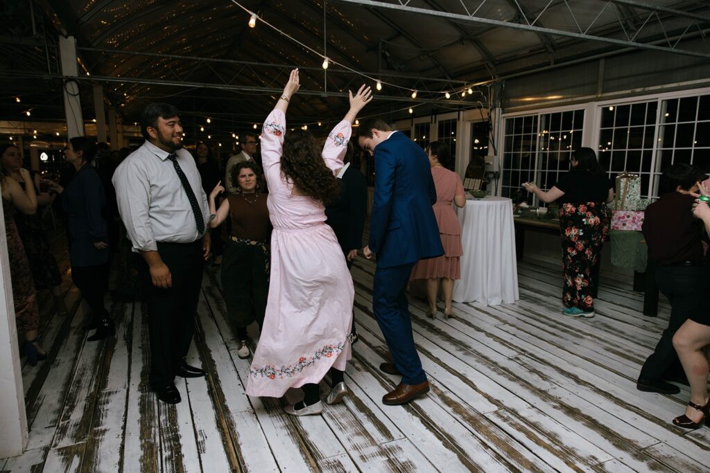 Guests dancing at a wedding reception