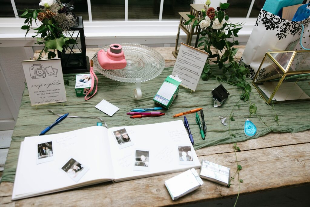Memory book on a table at a Showalter's Orchard and Greenhouse wedding