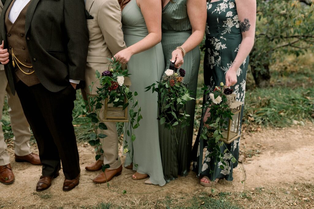 Flower adorned lantern decorations at a Showalter's Orchard and Greenhouse Wedding
