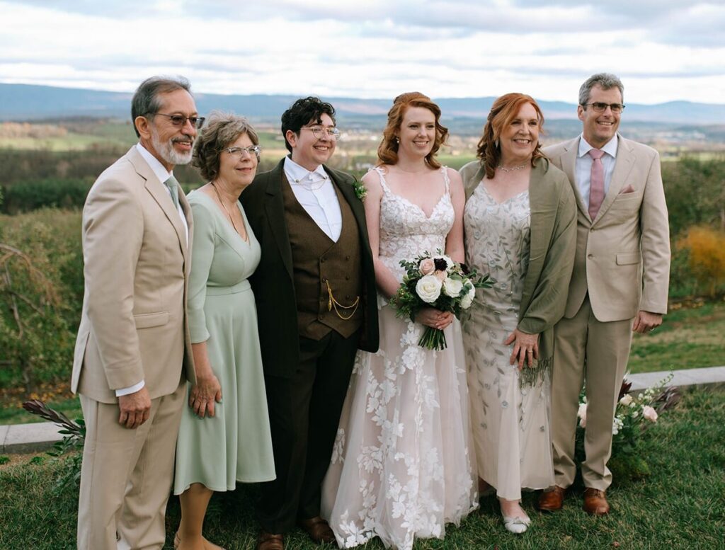 Family portraits at a Showalter's Orchard and Greenhouse Wedding