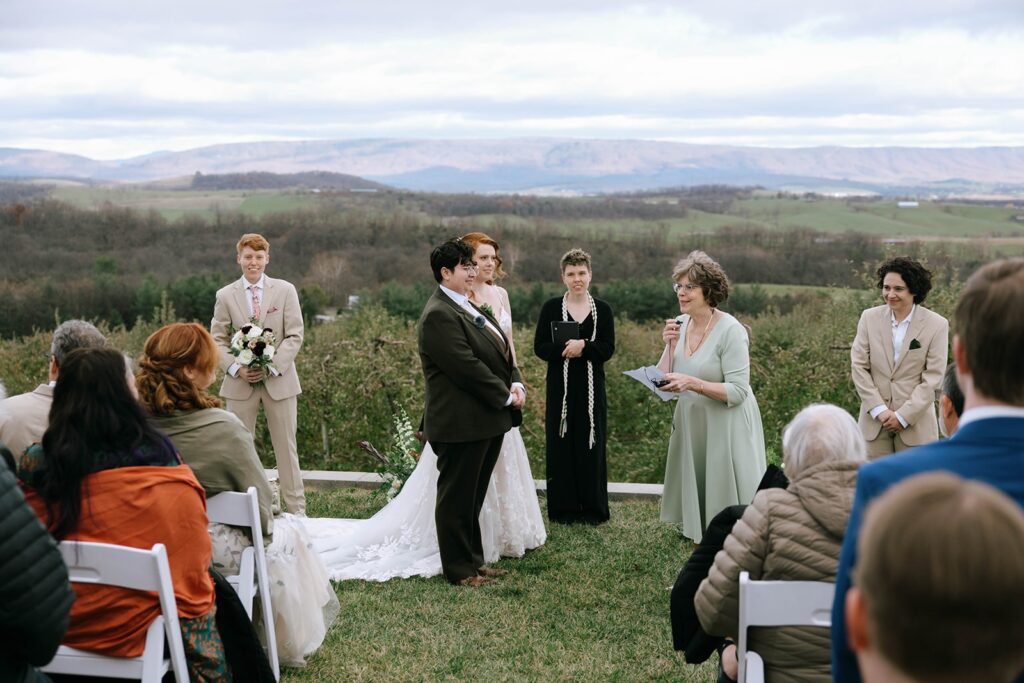 The mother of a spouse sharing a poem at the ceremony