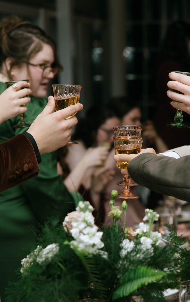 Guests toasting at a wedding reception