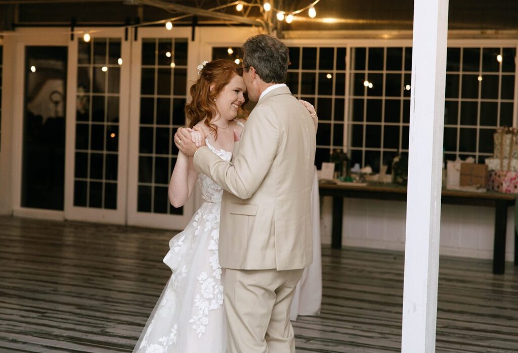A spouse and her father dancing