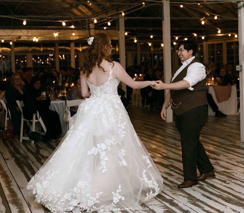 A newlywed couple doing their first dance